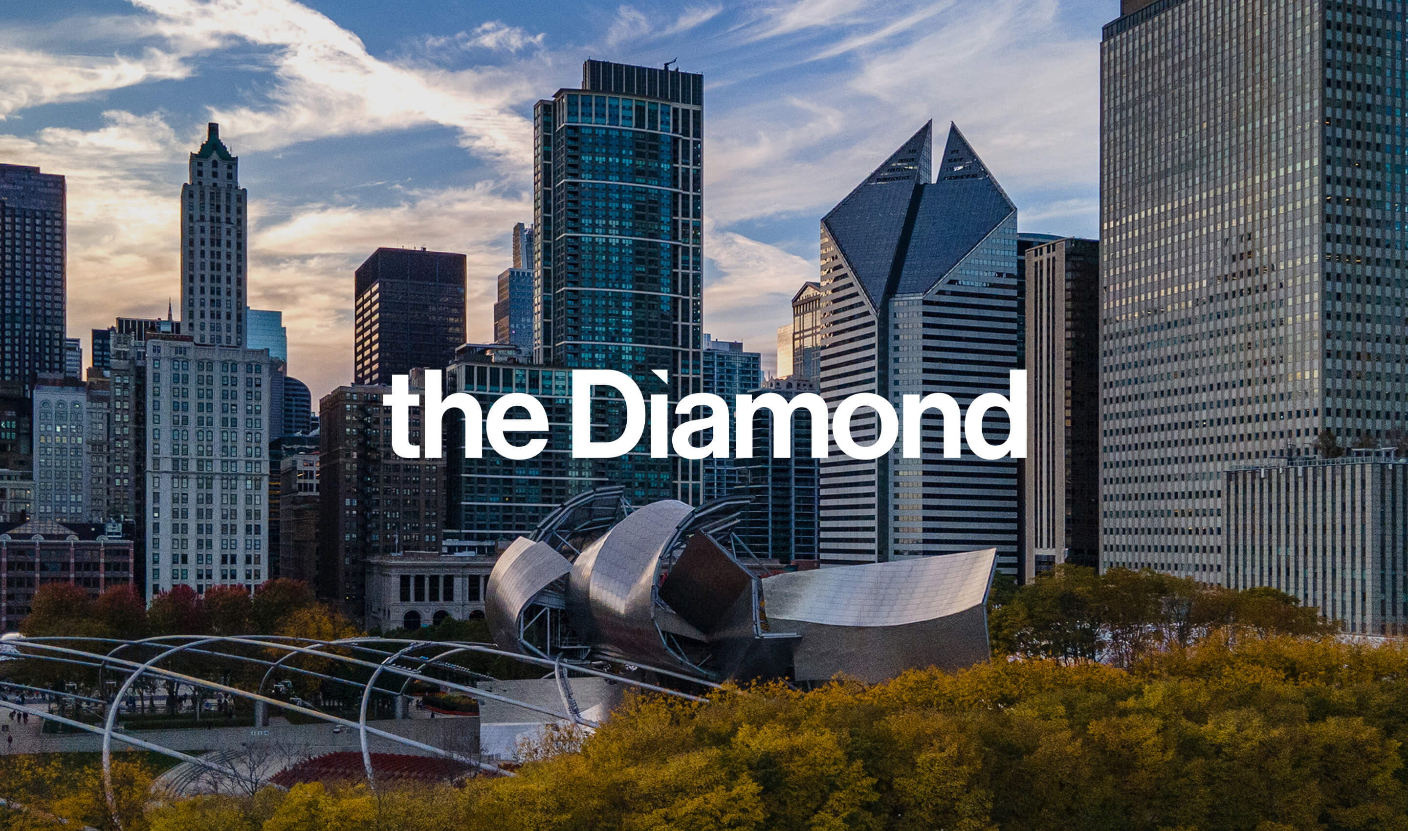 A view of the Chicago skyline that prominently features The Diamond building and its brand identity