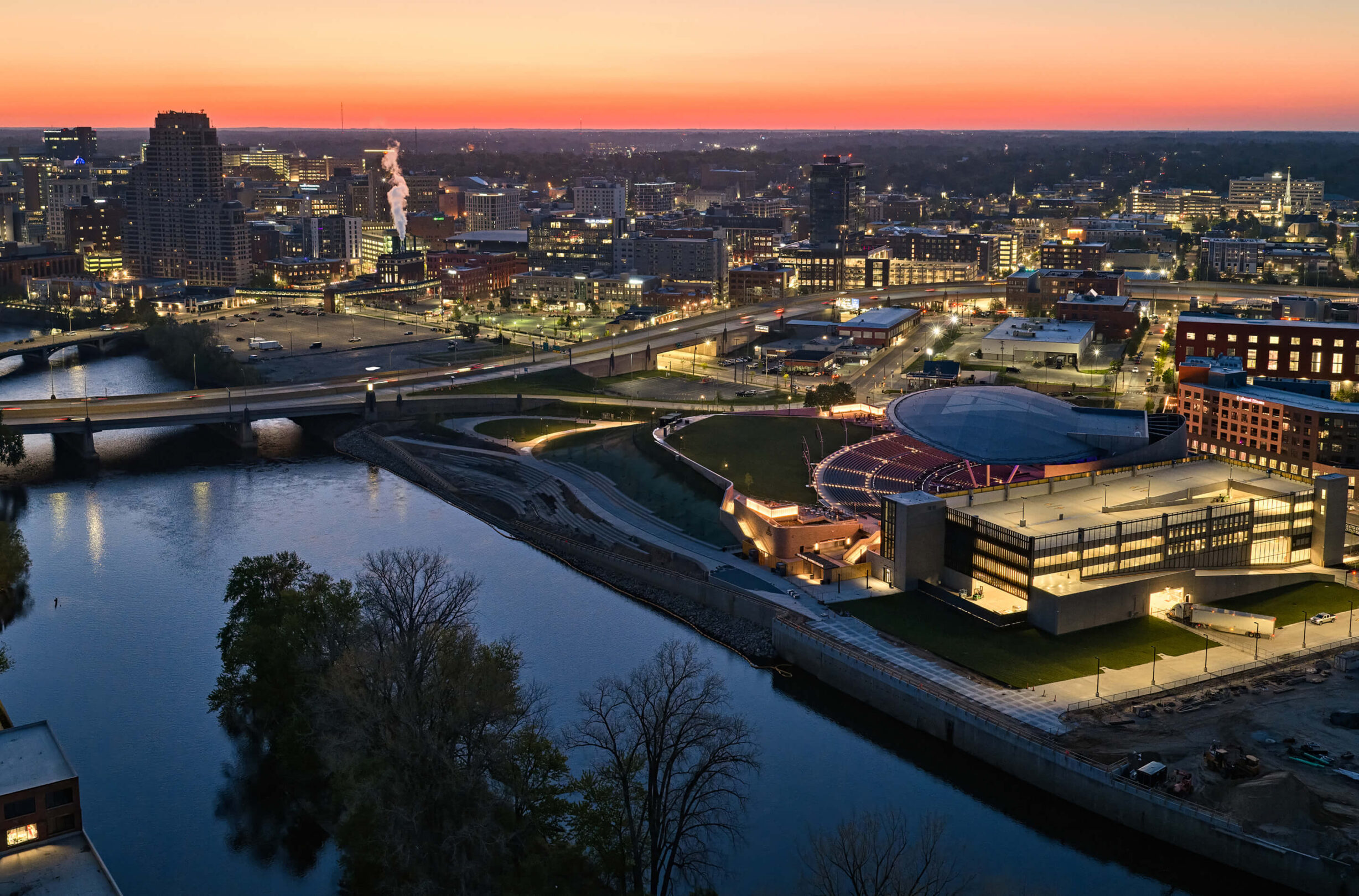 Aerial view of Acrisure Amphitheater at night.