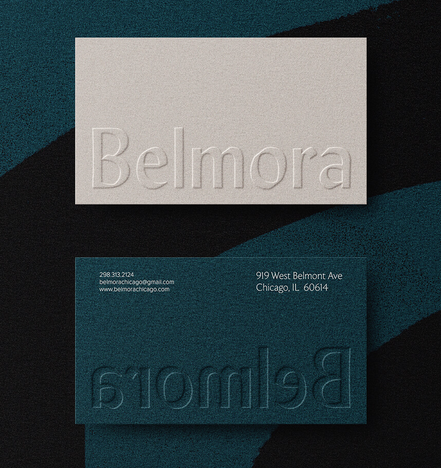 Front and back side of a business card for Belmora